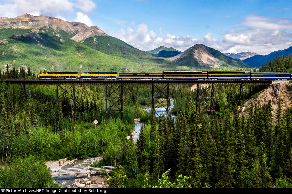 Northbound passenger train across Riley's Creek Trestle in Denali National Park